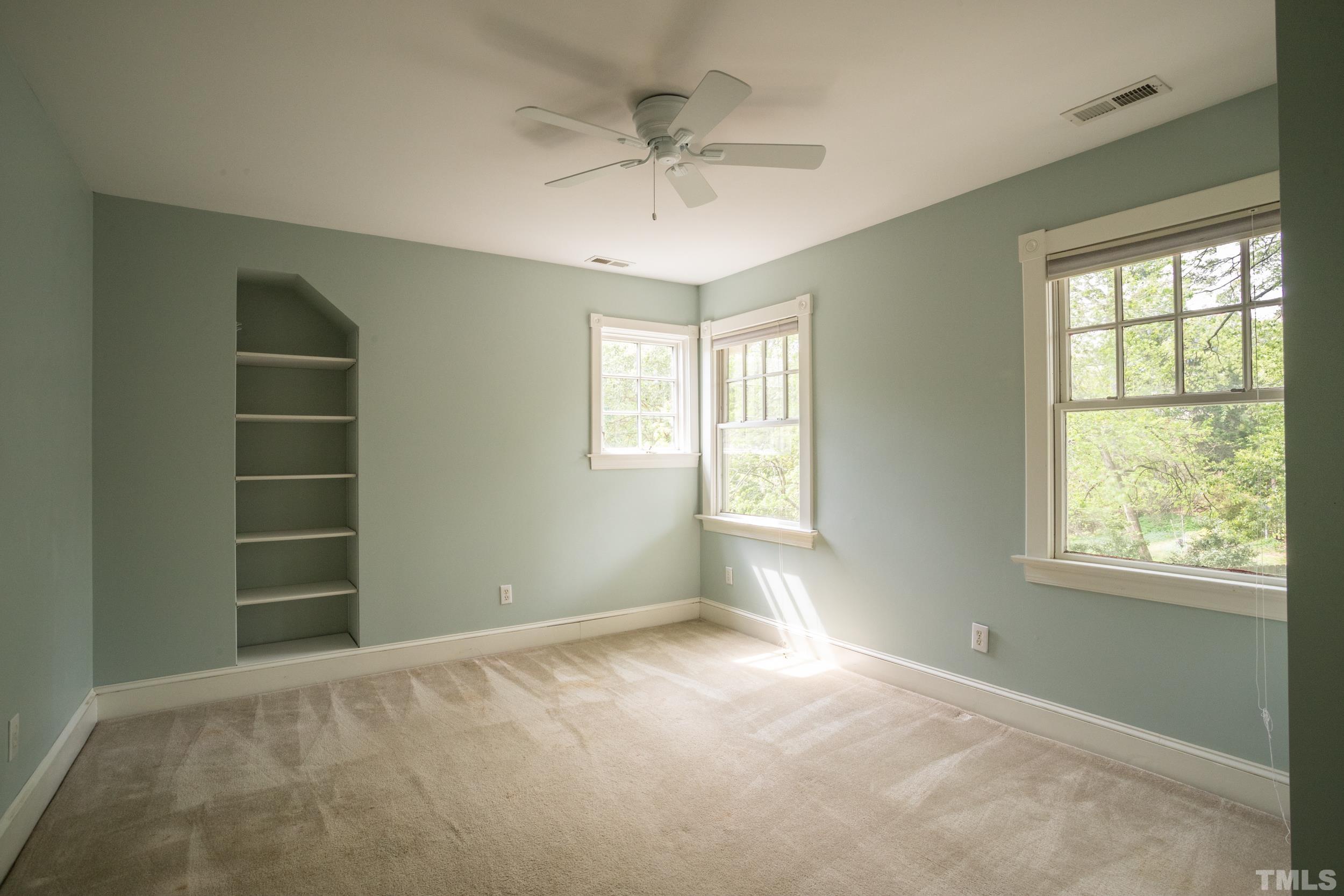 1903 Alexander Road Raleigh, NC 27608 - Photo 21 of 26 a view of an empty room with a window
