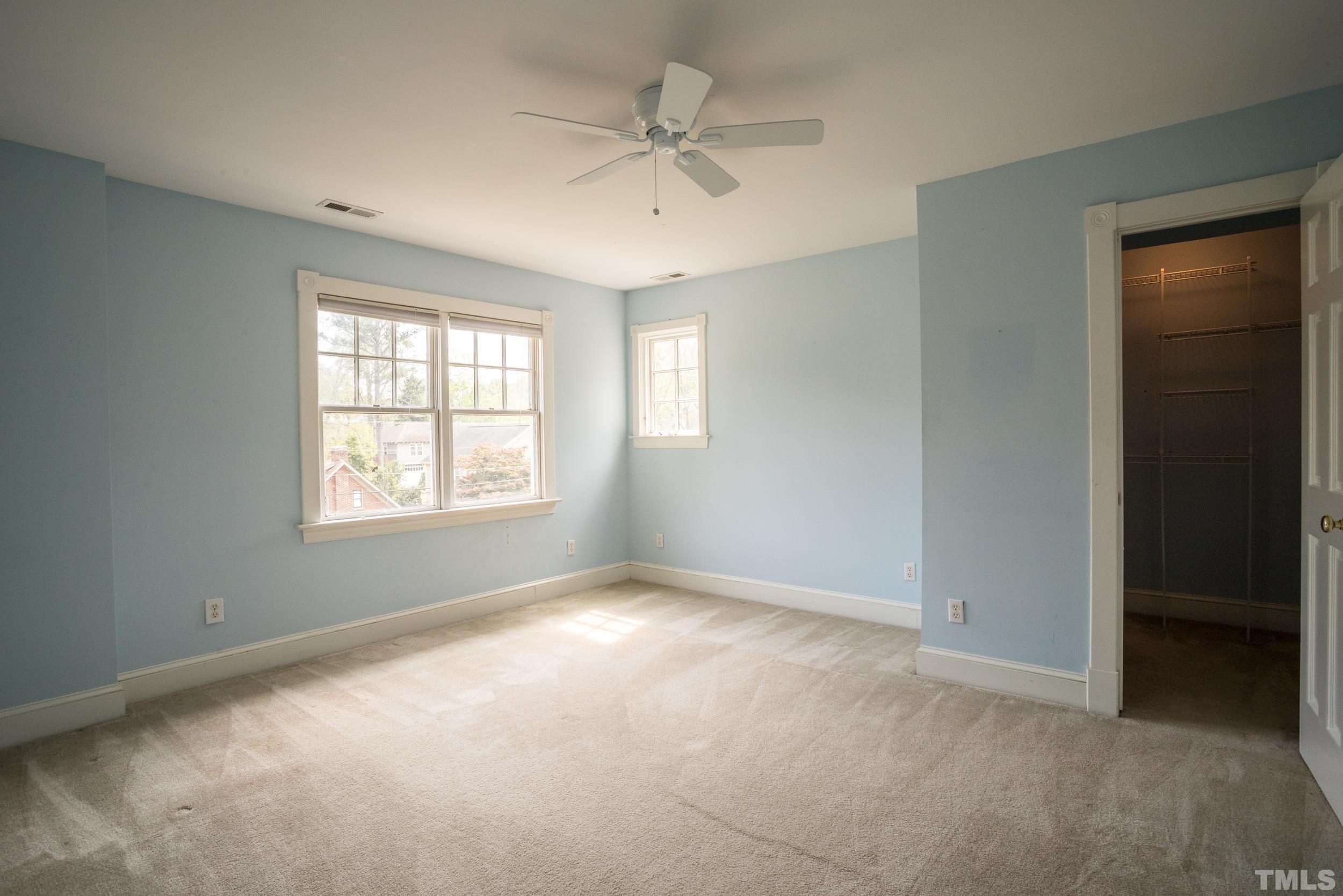 1903 Alexander Road Raleigh, NC 27608 - Photo 22 of 26 an empty room with windows and closet