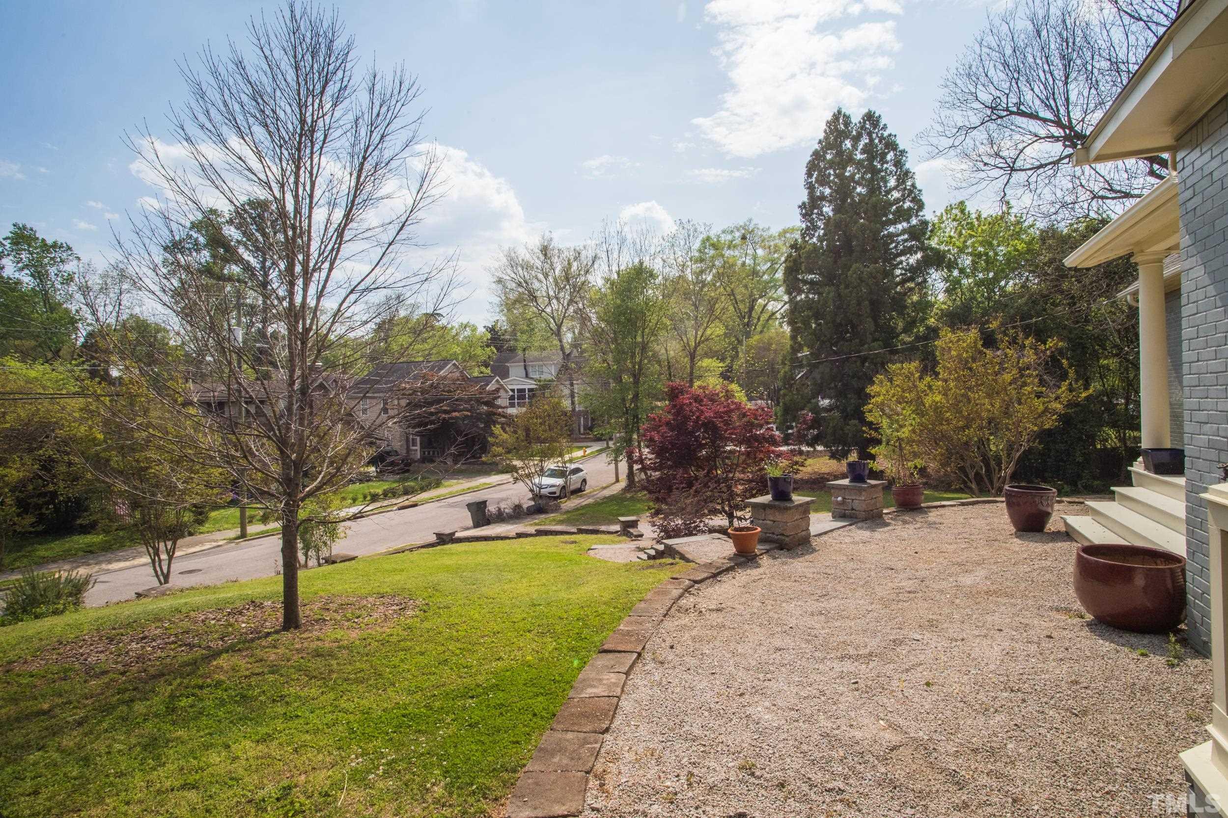 1903 Alexander Road Raleigh, NC 27608 - Photo 4 of 26 a view of a backyard with sitting area