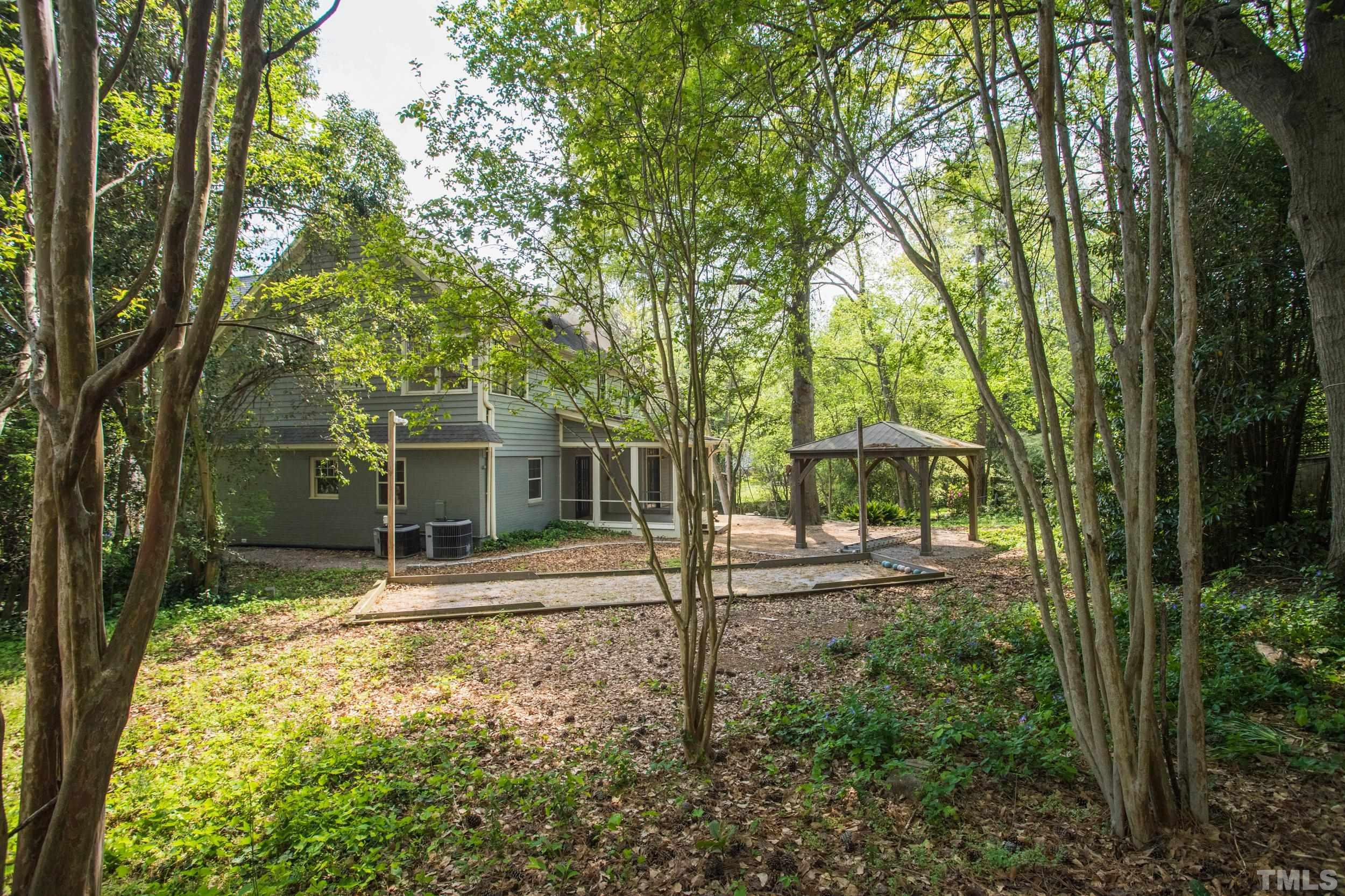 1903 Alexander Road Raleigh, NC 27608 - Photo 5 of 26 a house view with a backyard space