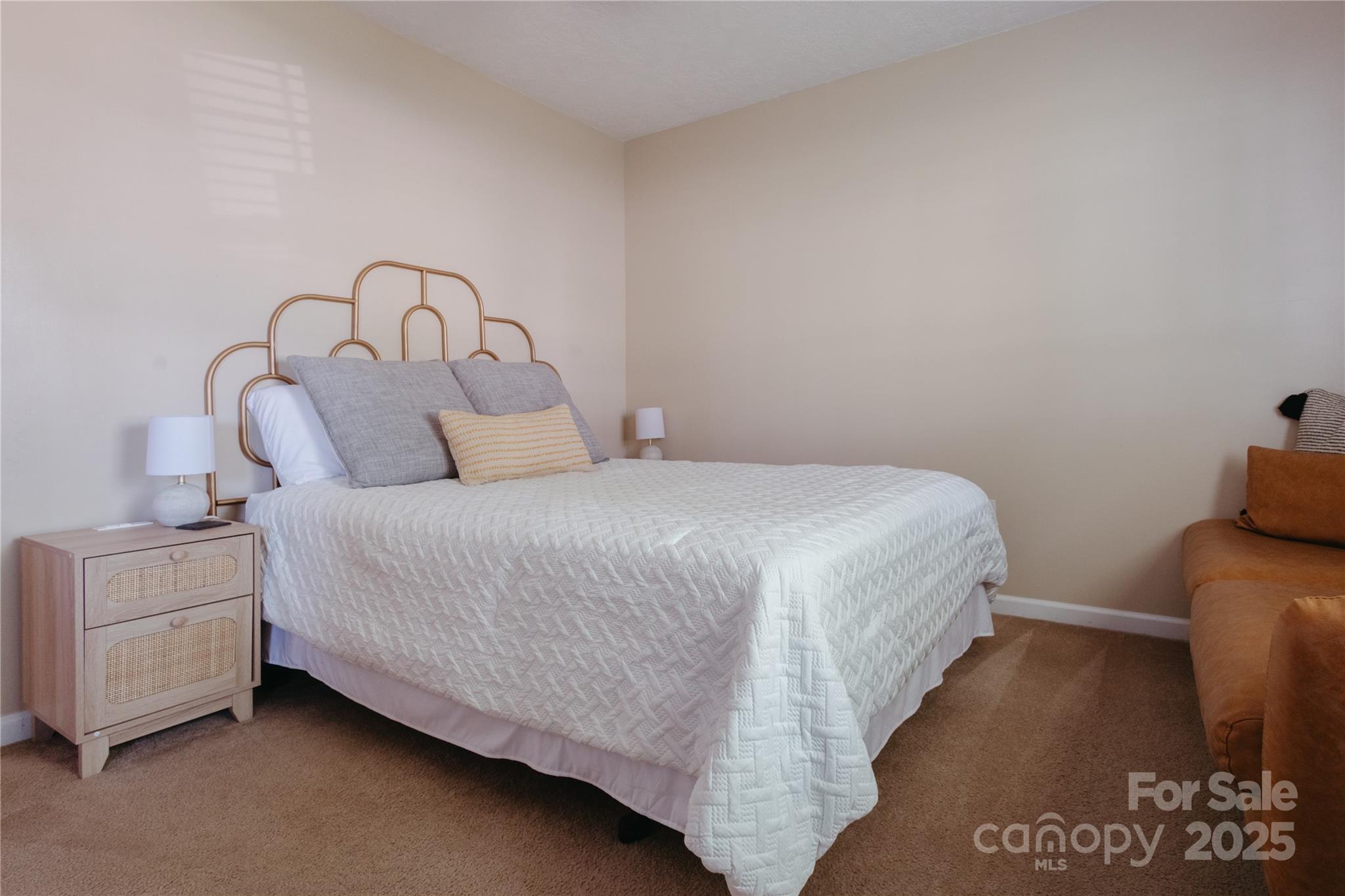 68 Lorry Court North Augusta, SC 29841 - Photo 11 of 16 a bedroom with a bed and a potted plant on table