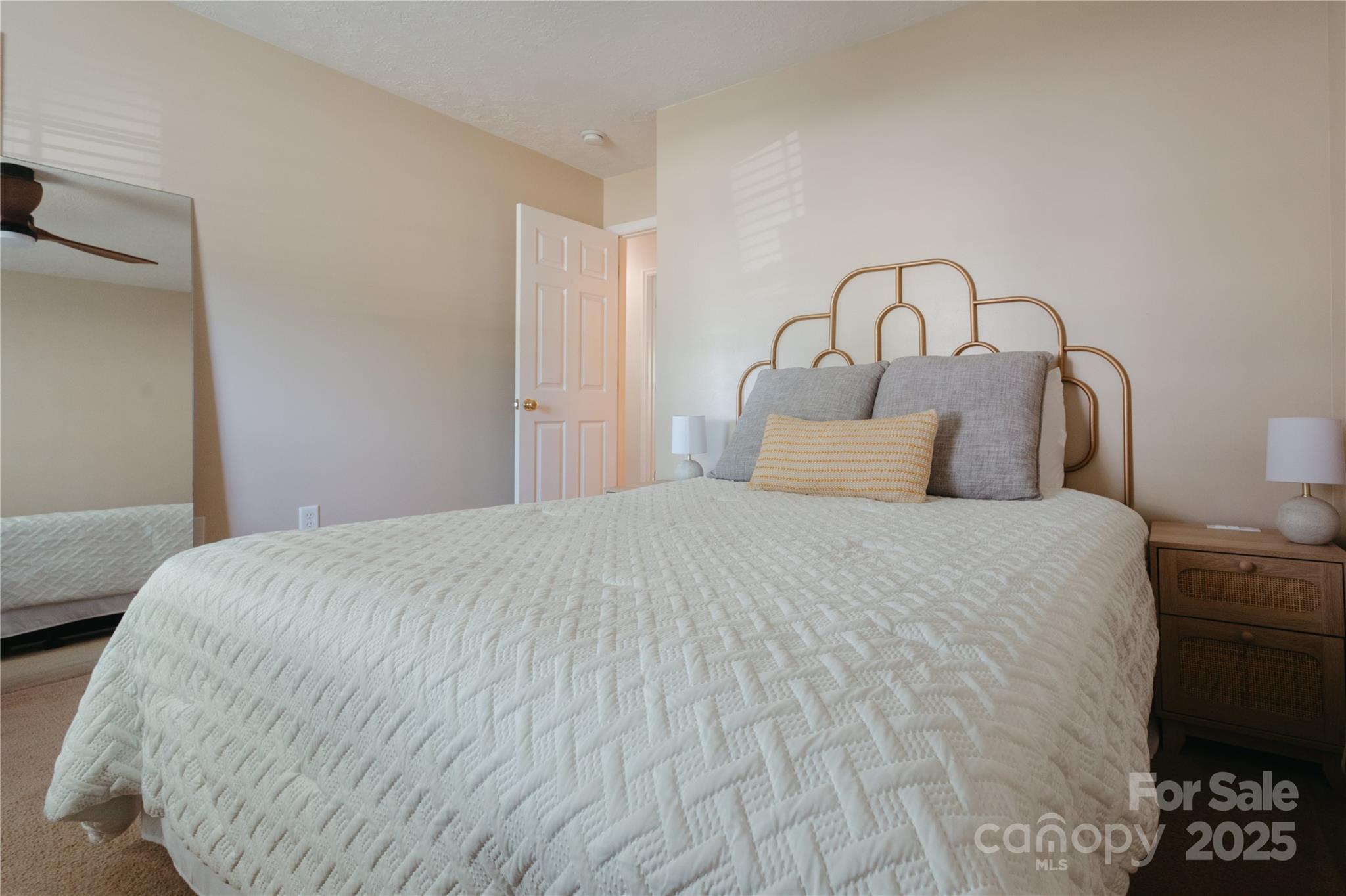 68 Lorry Court North Augusta, SC 29841 - Photo 12 of 16 a bedroom with a bed and a lamp on the dresser