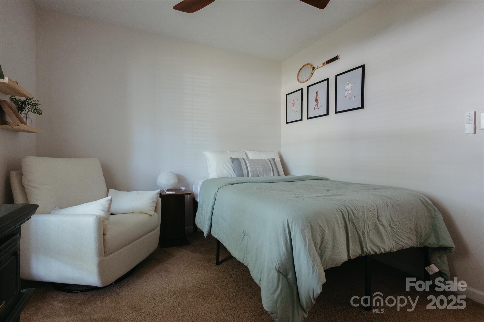 68 Lorry Court North Augusta, SC 29841 - Photo 14 of 16 a bedroom with a bed and a painting on the wall