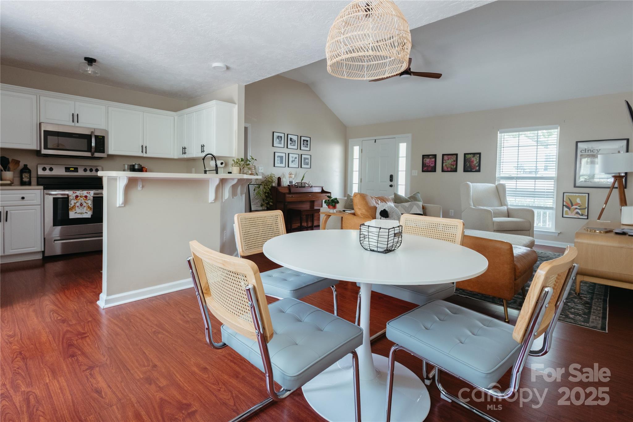 68 Lorry Court North Augusta, SC 29841 - Photo 3 of 16 a view of a dining room with furniture a kitchen and chandelier