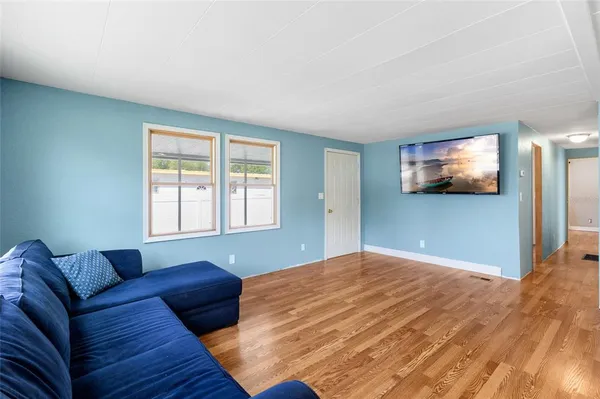 a view of swimming pool with seating area