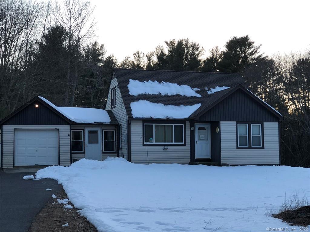 247 Cook Hill Road Killingly, CT 06239 - Photo 1 of 1 a front view of a house with a garden