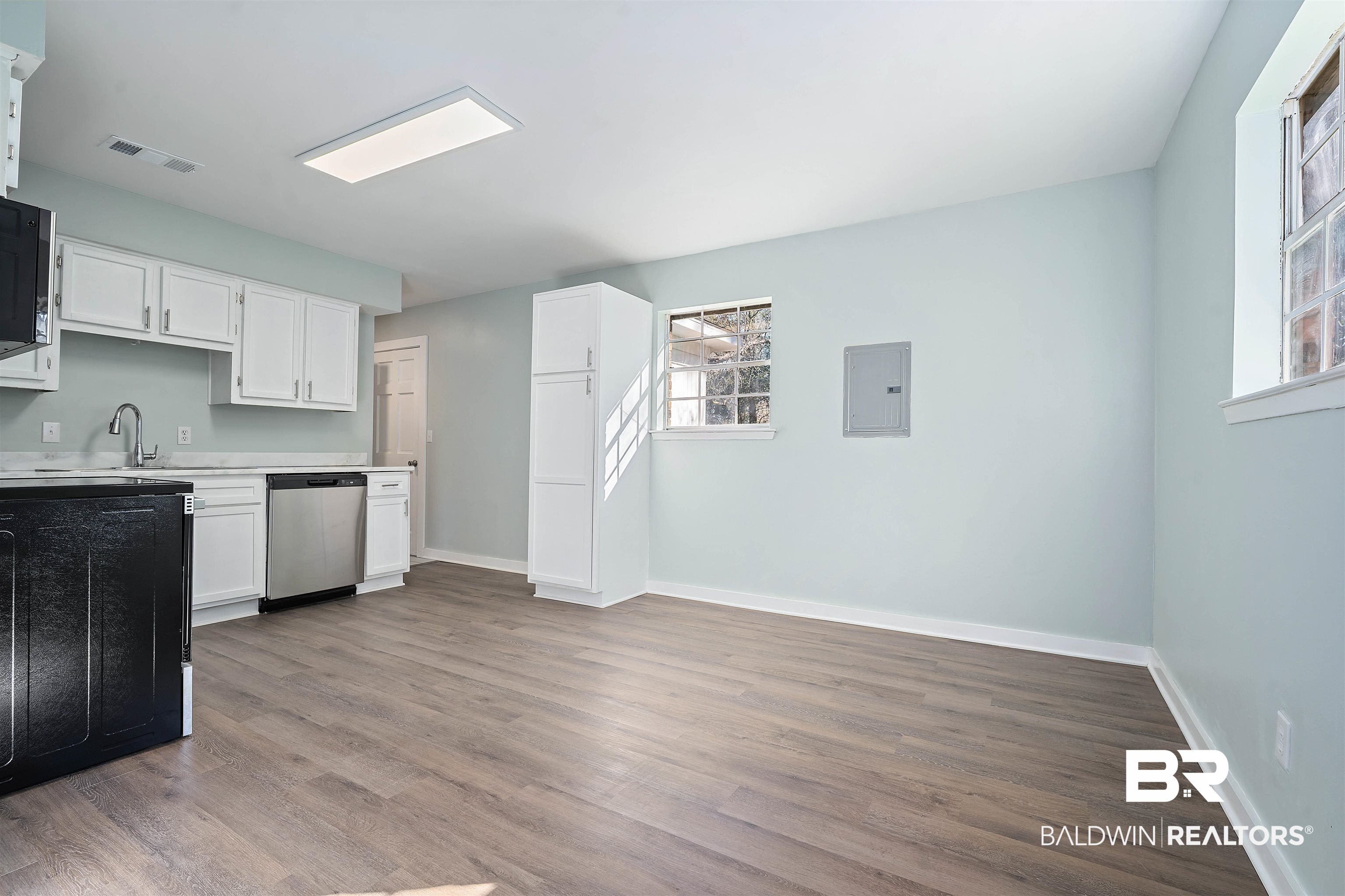 1368 Hubert Pierce Road Mobile, AL 36608 - Photo 7 of 25 Kitchen with light countertops, white cabinetry, dishwasher, and dark wood-style floors
