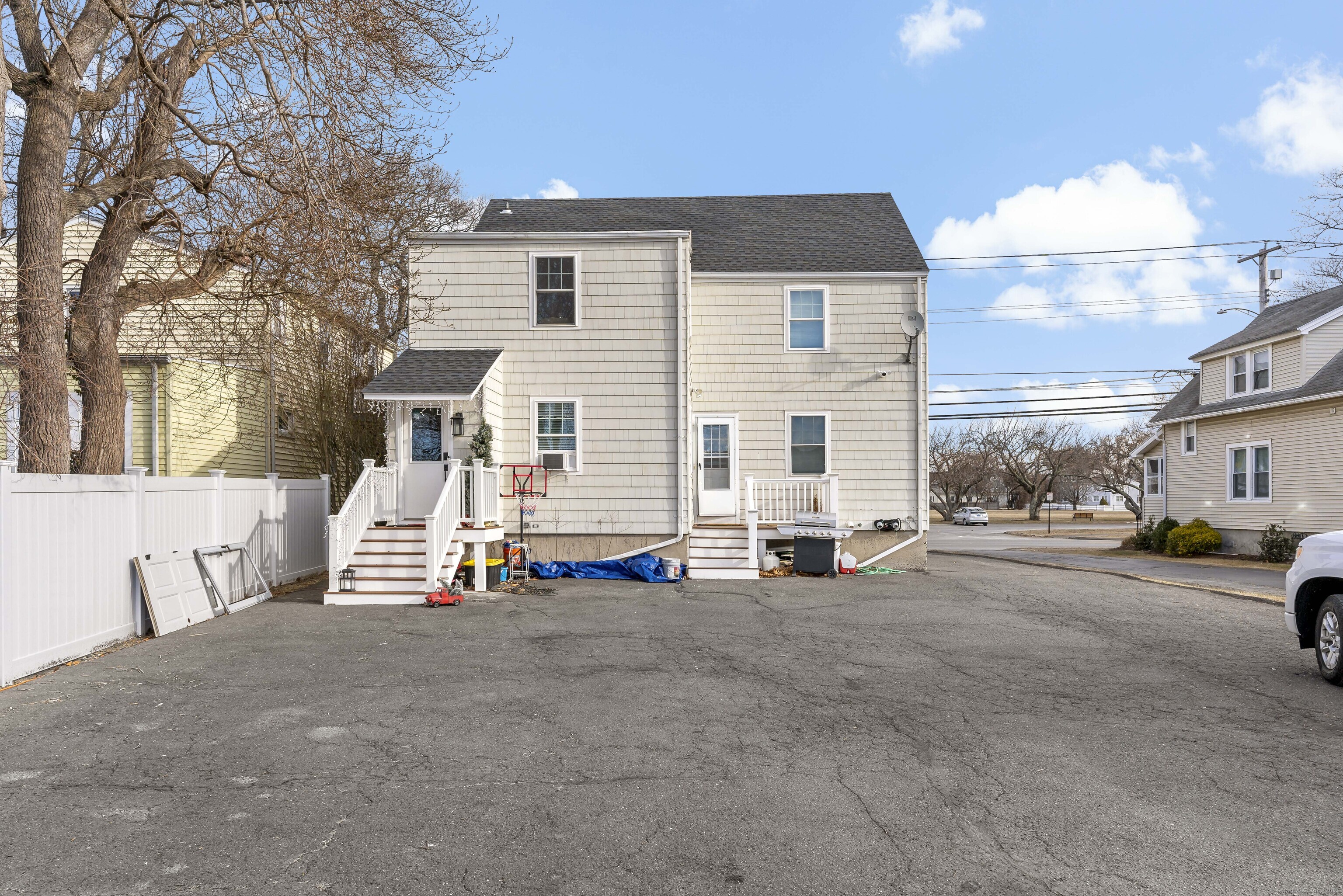 788 Reef Road Fairfield, CT 06824 - Photo 4 of 17 a view of a house with a patio