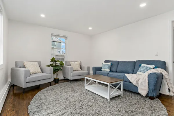 a living room with furniture and a couch