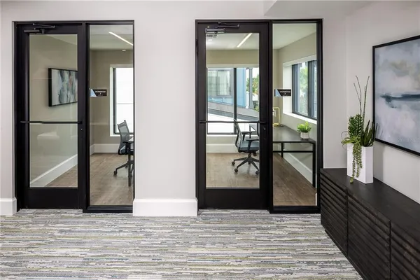 a utility room with sink dryer and washer