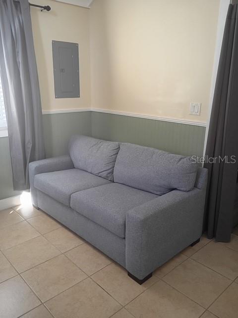 1622 9th Street, Unit B Sarasota, FL 34236 - Photo 9 of 15 a living room with furniture and a window