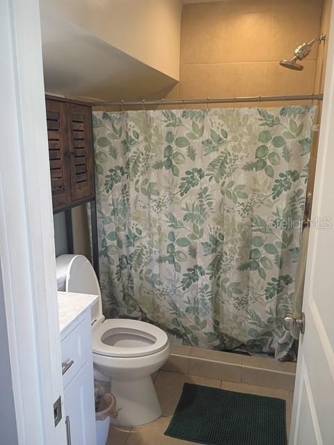 1622 9th Street, Unit B Sarasota, FL 34236 - Photo 10 of 15 a bathroom with a toilet and a shower