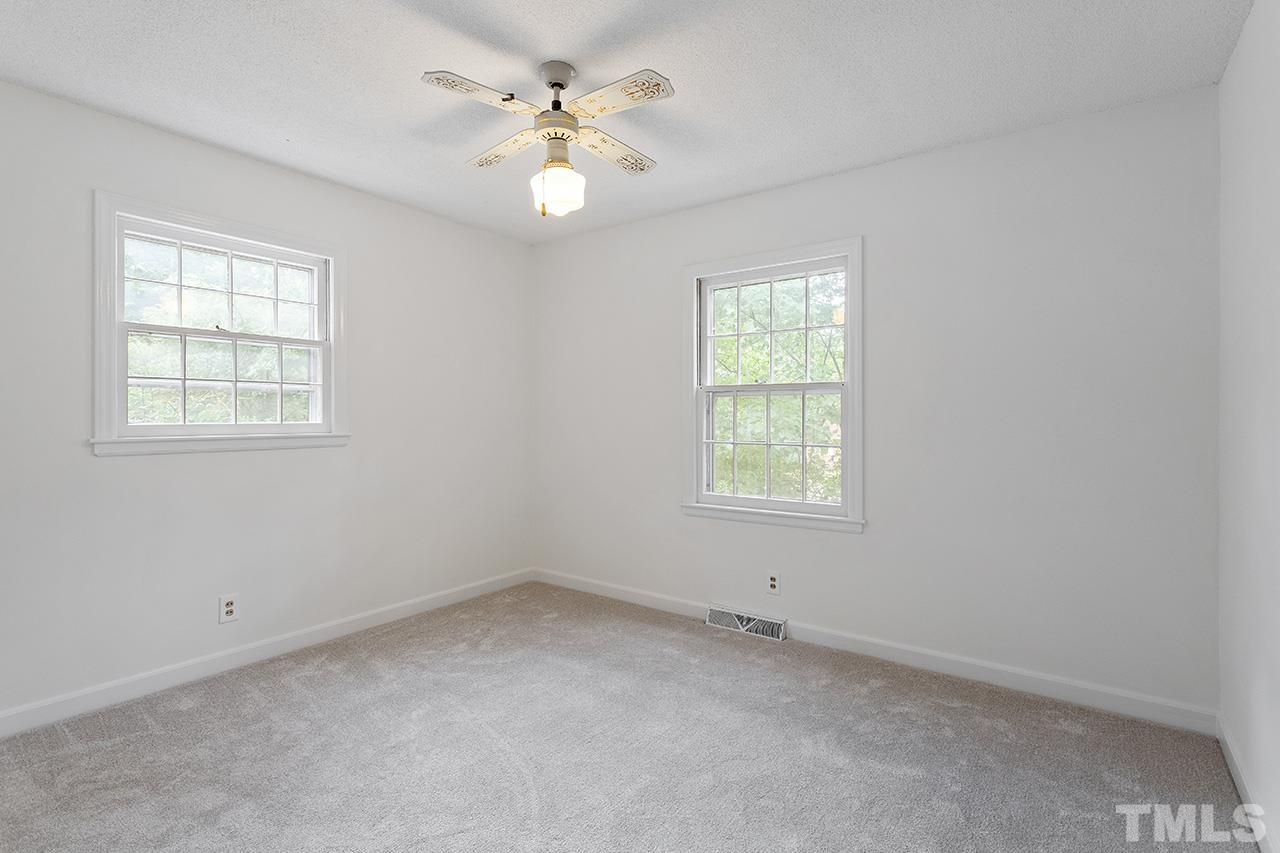 6407 Amhurst Road Durham, NC 27713 - Photo 21 of 28 an empty room with a window