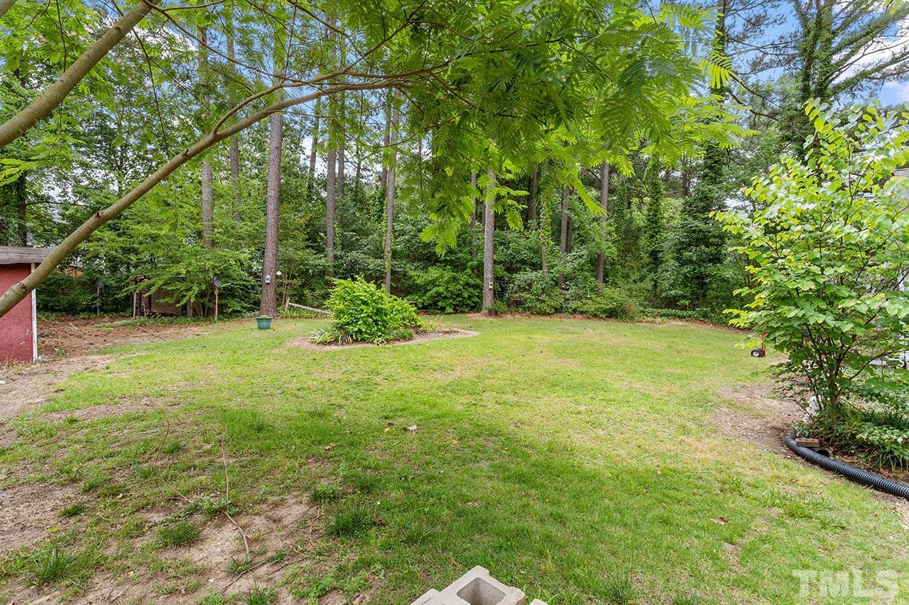 6407 Amhurst Road Durham, NC 27713 - Photo 24 of 28 a view of green field with trees in the background