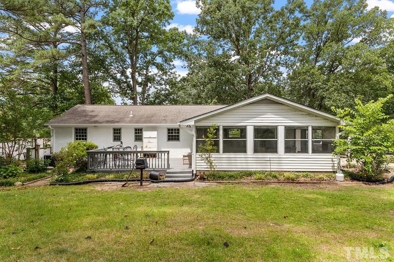 6407 Amhurst Road Durham, NC 27713 - Photo 25 of 28 a front view of a house with a garden