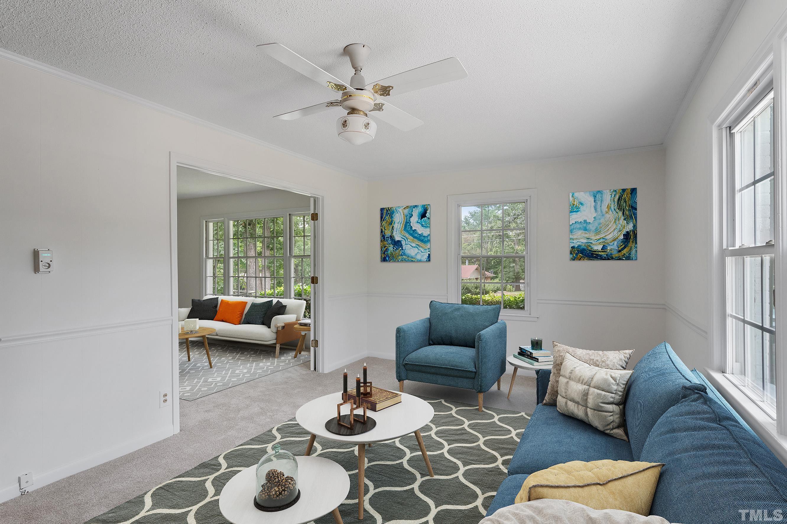 6407 Amhurst Road Durham, NC 27713 - Photo 5 of 28 a living room with furniture and a window