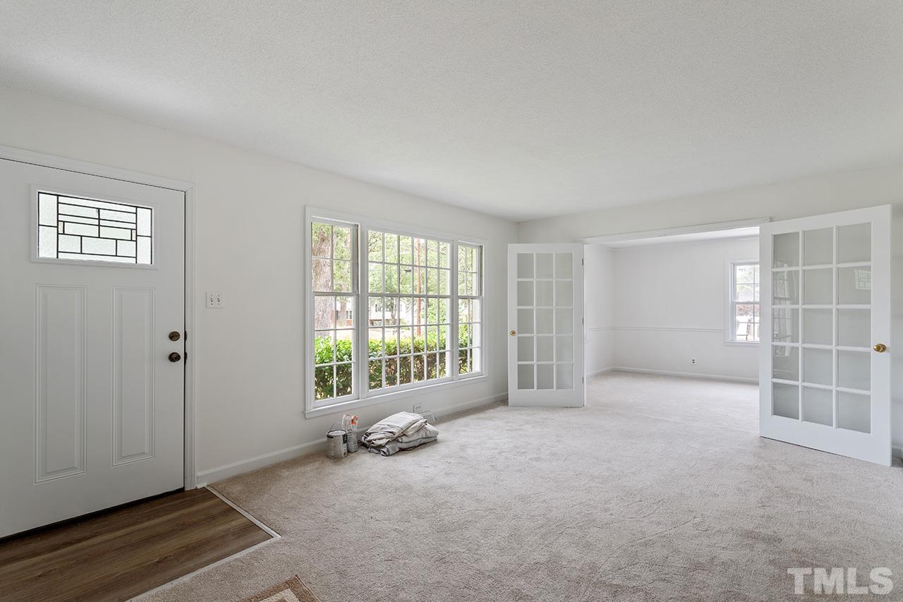6407 Amhurst Road Durham, NC 27713 - Photo 8 of 28 a view of an empty room with a window