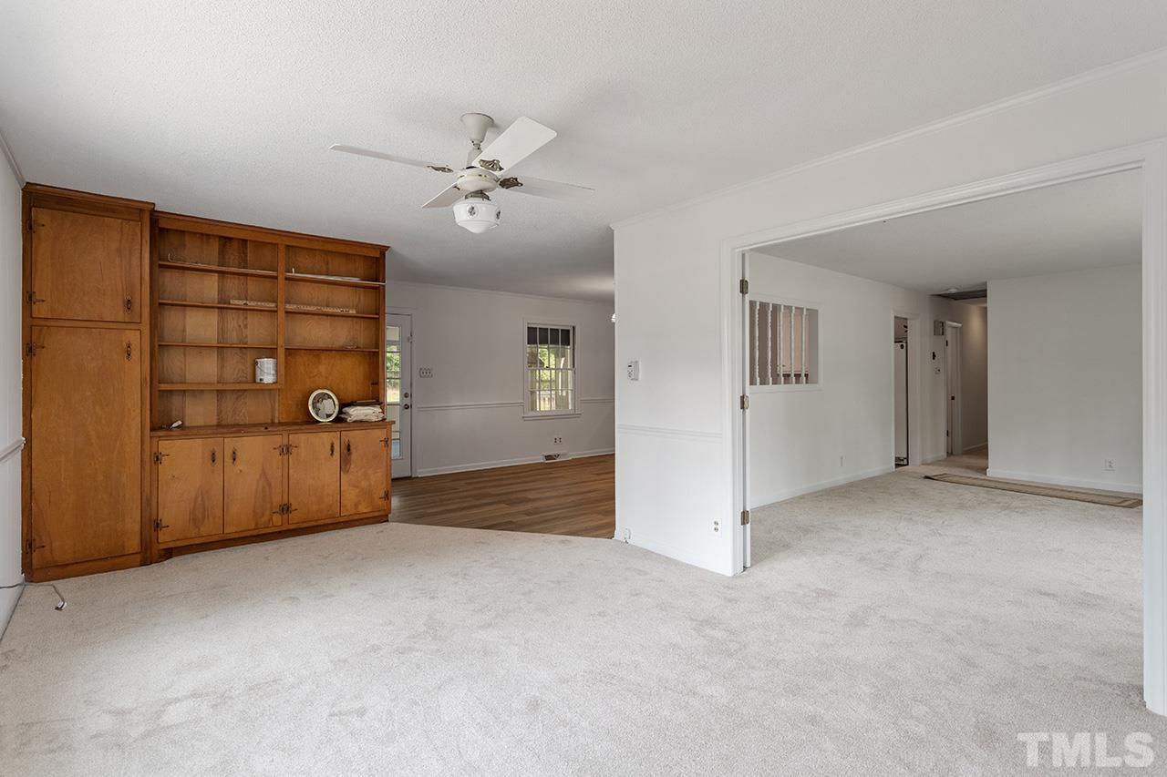 6407 Amhurst Road Durham, NC 27713 - Photo 9 of 28 a view of empty room with ceiling fan
