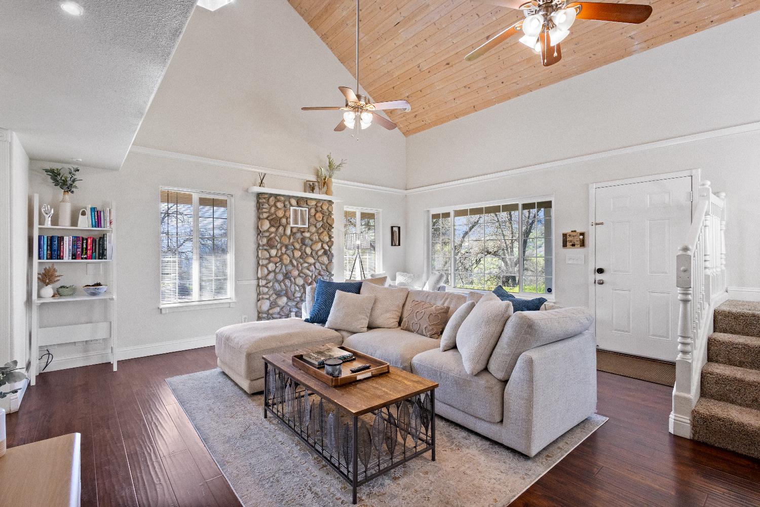 35171 Sand Creek Road Squaw Valley, CA 93675 - Photo 2 of 35 a living room with furniture a wooden floor and a large window