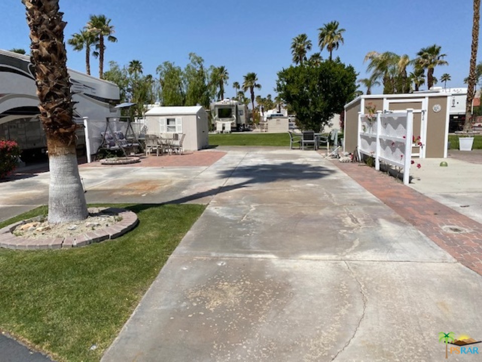 69801 Ramon Road, Unit 378 Cathedral City, CA 92234 - Photo 1 of 5 a view of a park with of swings