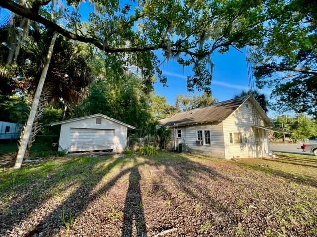 1010 South Main Street Bell, FL 32619 - Photo 4 of 14 a front view of a house with garden