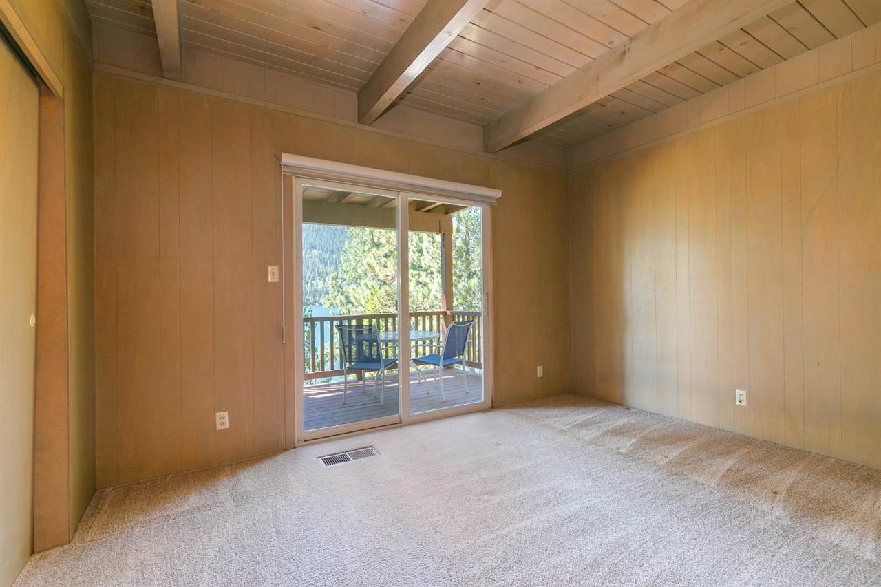 14300 Donner Pass Road Truckee, CA 96161 - Photo 12 of 20 a view of an empty room with wooden floor and a window