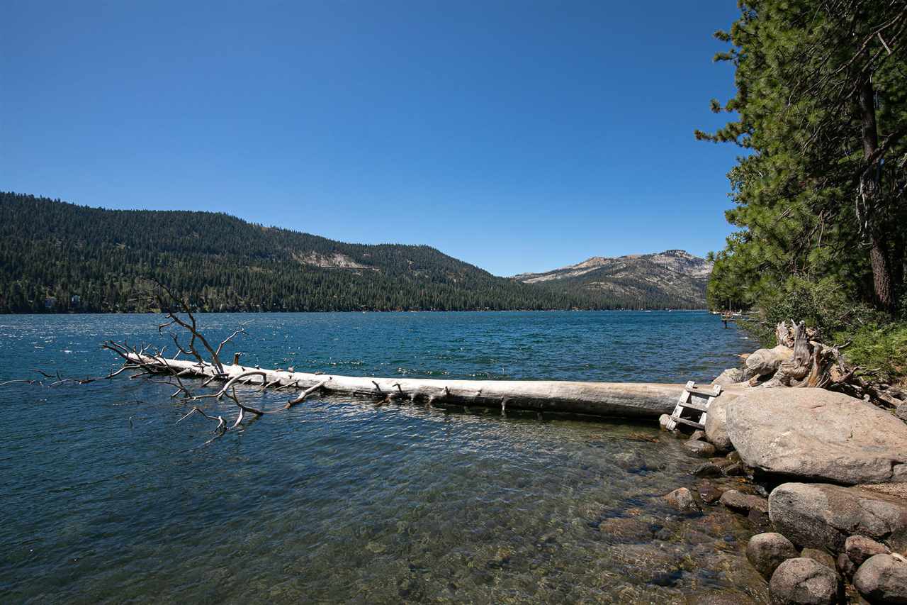 14300 Donner Pass Road Truckee, CA 96161 - Photo 19 of 20 a view of a lake with a mountain and a yard