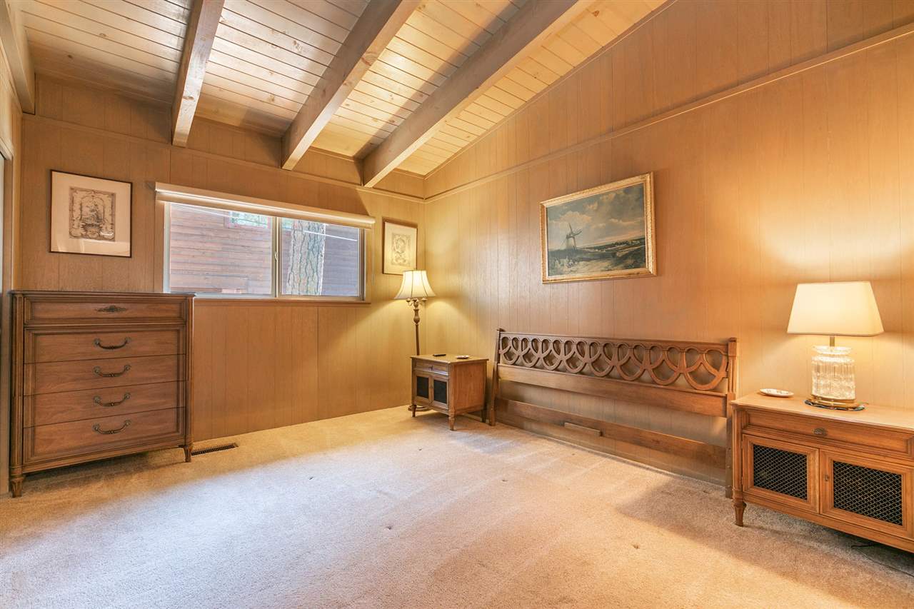 14300 Donner Pass Road Truckee, CA 96161 - Photo 10 of 20 a bedroom with furniture and a window