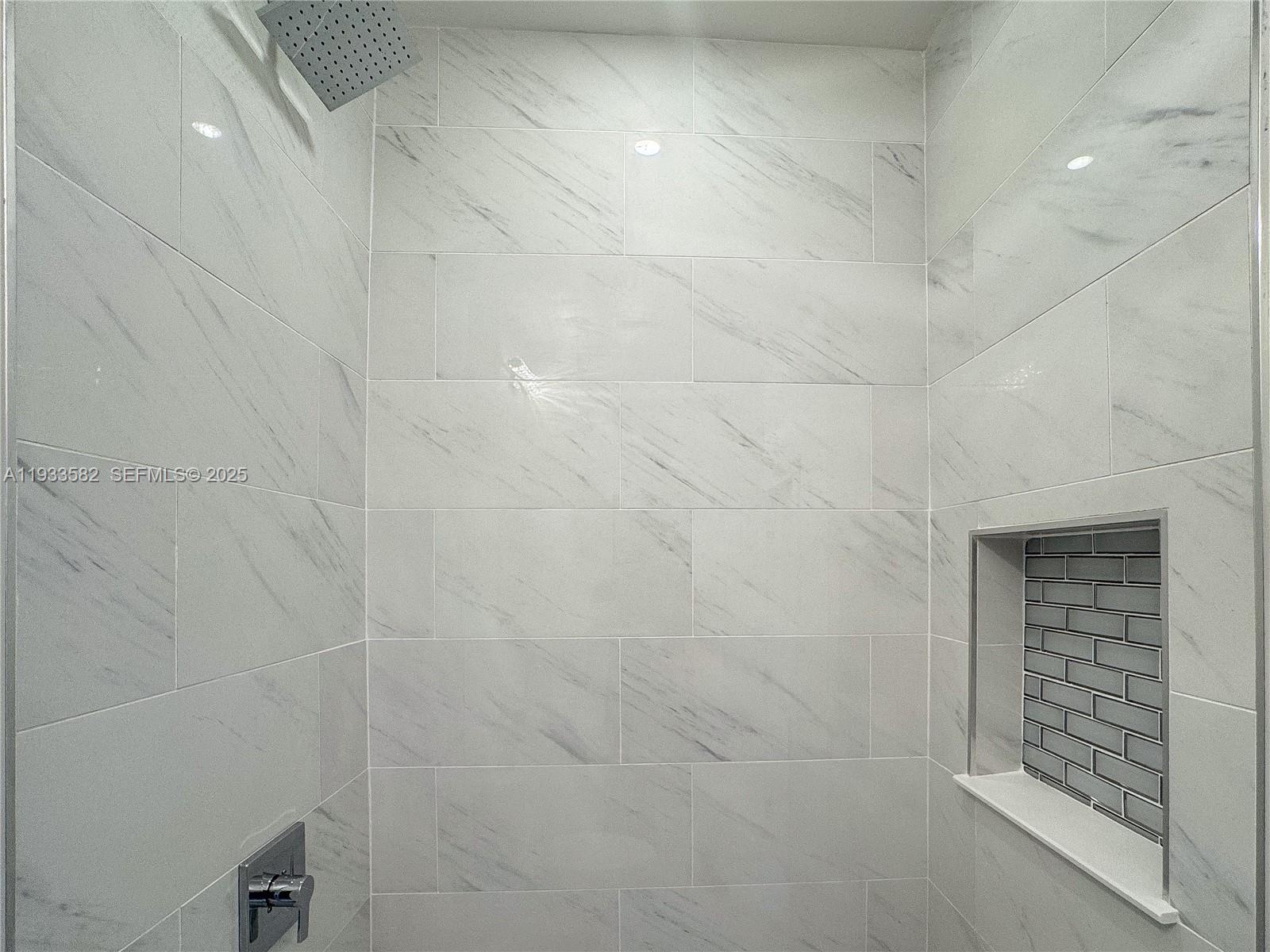 794 Northwest 44th Street Miami, FL 33127 - Photo 24 of 31 a bathroom with a shower