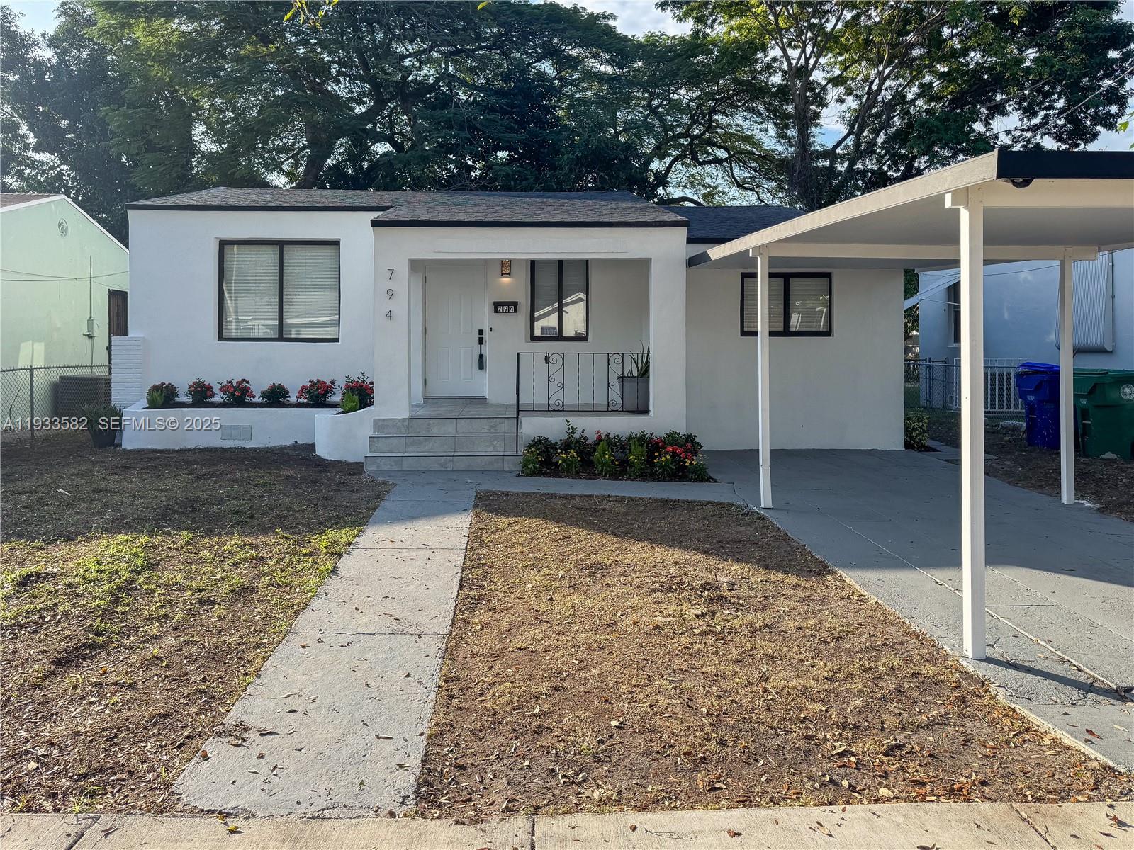794 Northwest 44th Street Miami, FL 33127 - Photo 3 of 31 a view of a backyard of the house