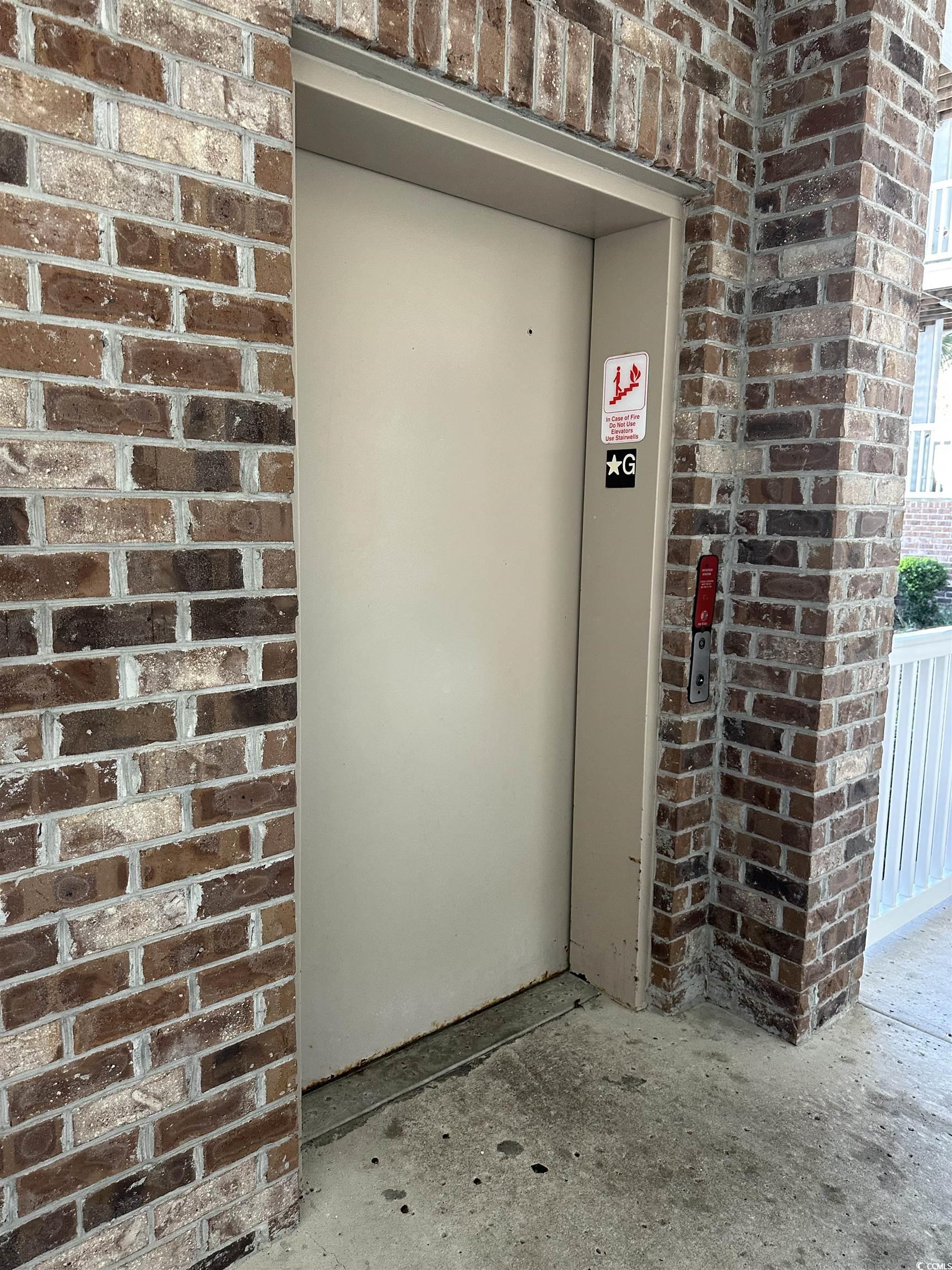 4811 Magnolia Lake Drive, Unit 302 Myrtle Beach, SC 29577 - Photo 28 of 39 Doorway to property with elevator