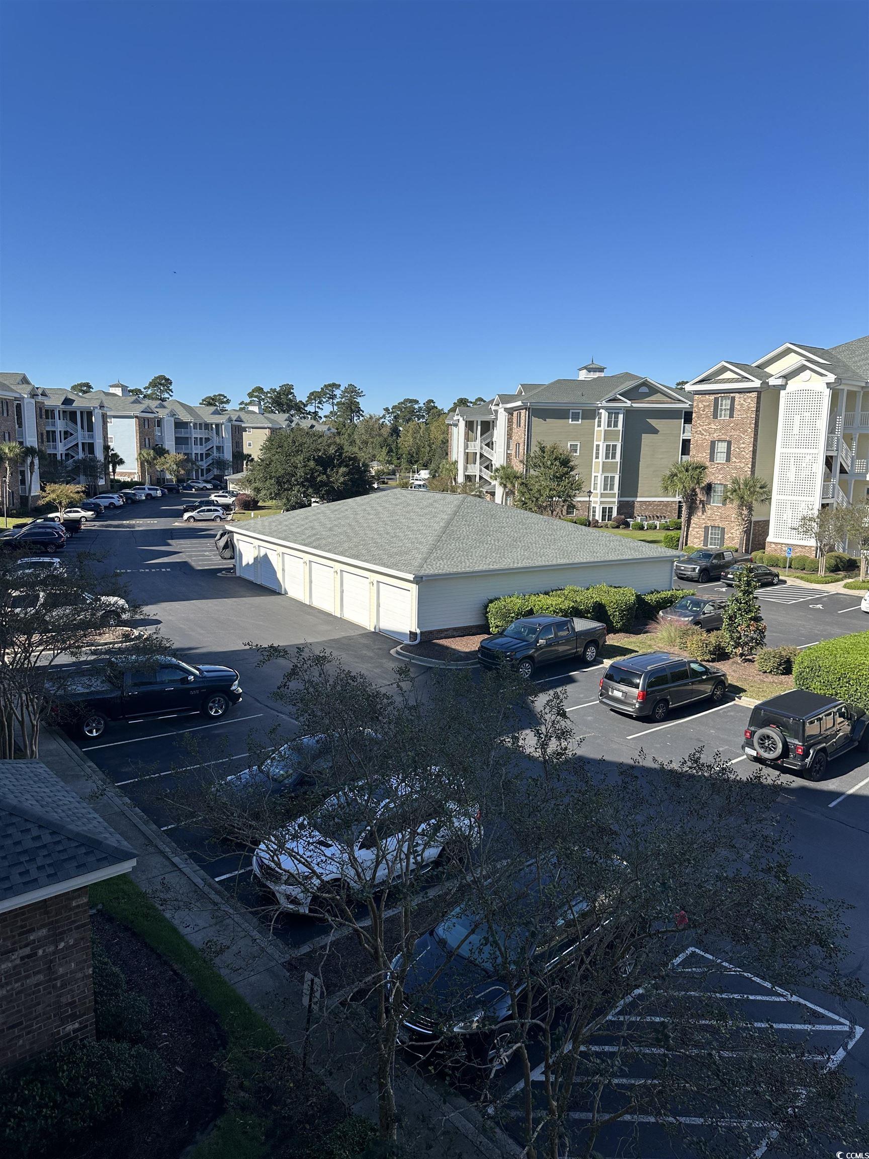 4811 Magnolia Lake Drive, Unit 302 Myrtle Beach, SC 29577 - Photo 34 of 39 View of asphalt street