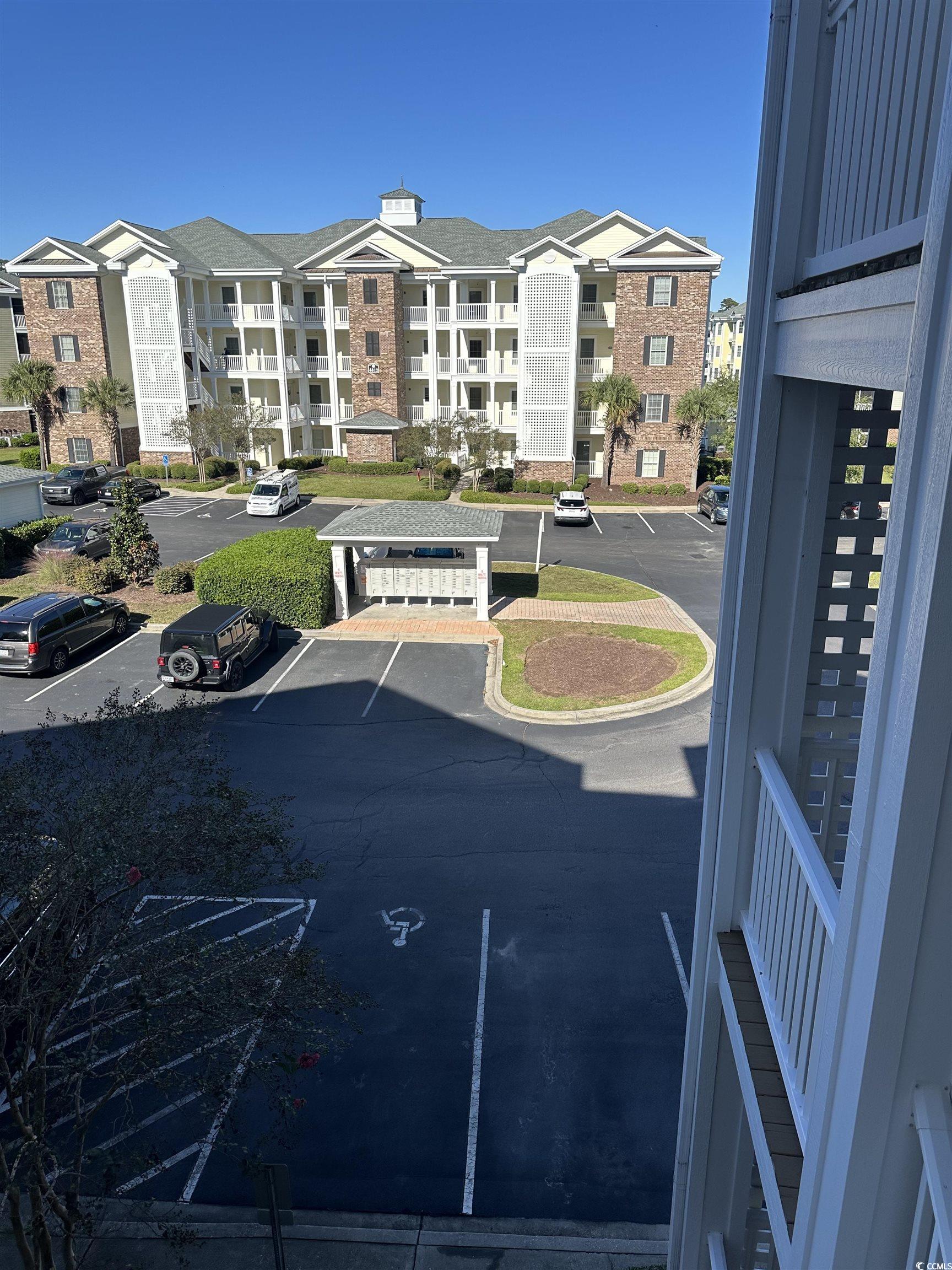4811 Magnolia Lake Drive, Unit 302 Myrtle Beach, SC 29577 - Photo 35 of 39 View of uncovered parking lot