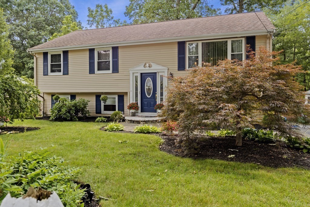 28 Edgewood Road Holbrook, MA 02343 - Photo 2 of 29 a front view of a house with a yard