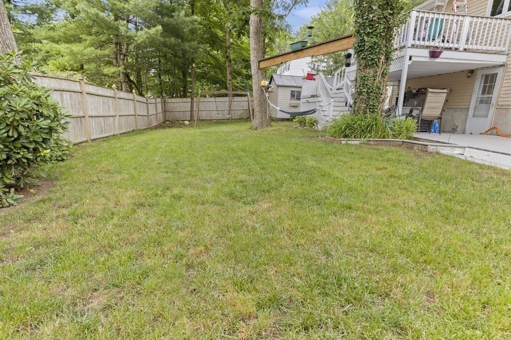 28 Edgewood Road Holbrook, MA 02343 - Photo 23 of 29 a view of a back yard of the house