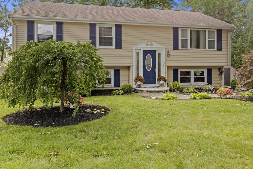 28 Edgewood Road Holbrook, MA 02343 - Photo 3 of 29 a front view of a house with a yard