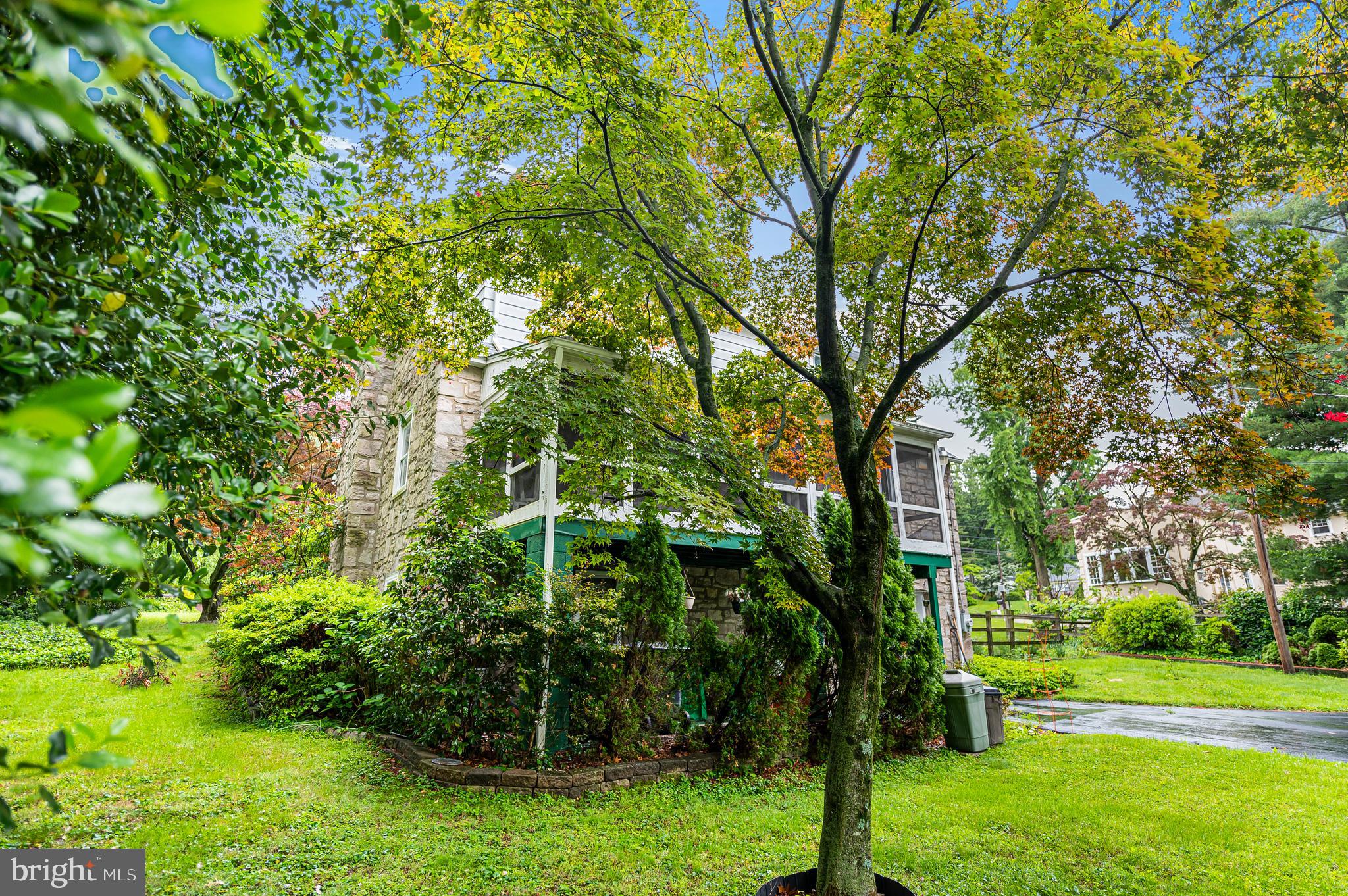 916 Rydal Road Jenkintown, PA 19046 - Photo 6 of 39 a view of a garden with a tree