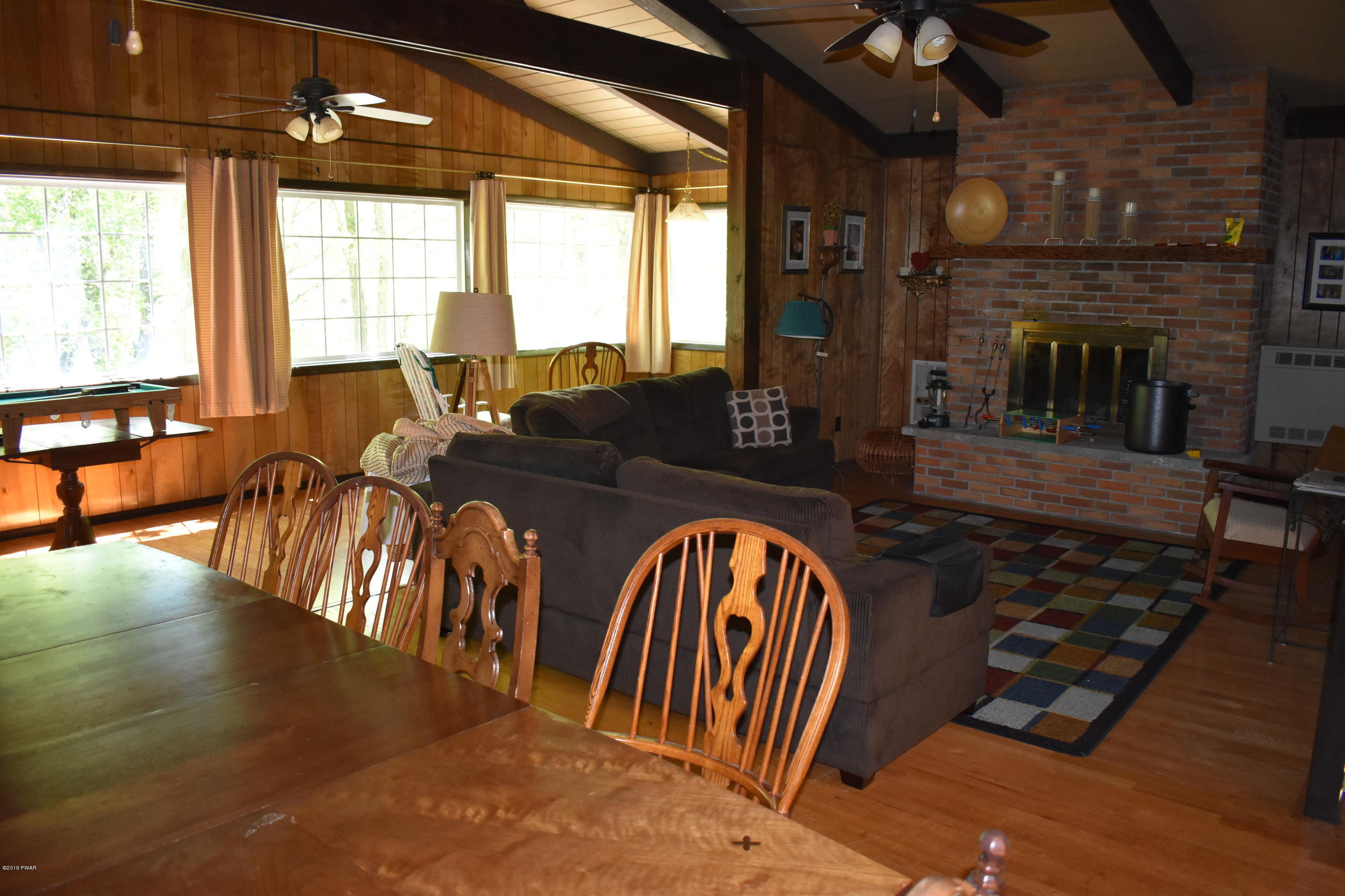 525 Maple Ridge Drive Hawley, PA 18428 - Photo 6 of 39 dining room into living room
