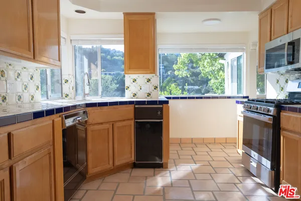 $8,499 | 2401 Meadow Valley Terrace, Los Angeles, CA 90039