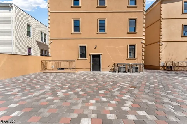 a view of a building with a street