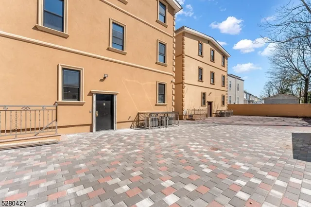 a view of a building with a street