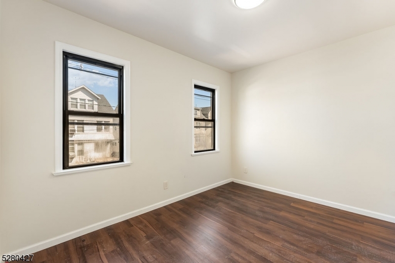 120 Paine Avenue, Unit 2R Irvington, NJ 07111 - Photo 10 of 16 an empty room with a window