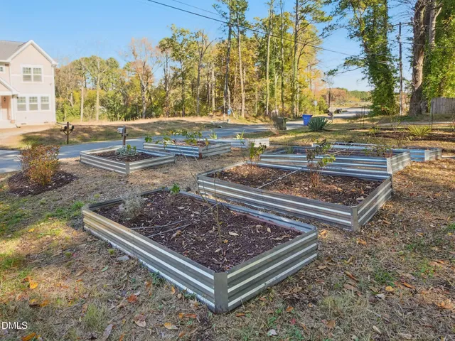 a view of a yard with an outdoor space