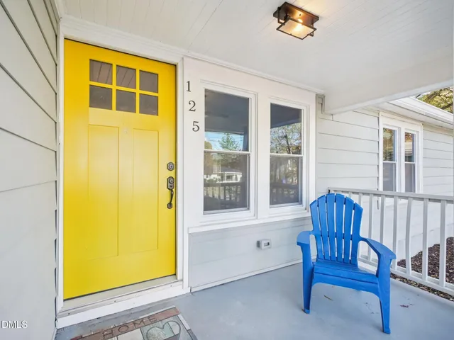a view of porch with a chair and couch