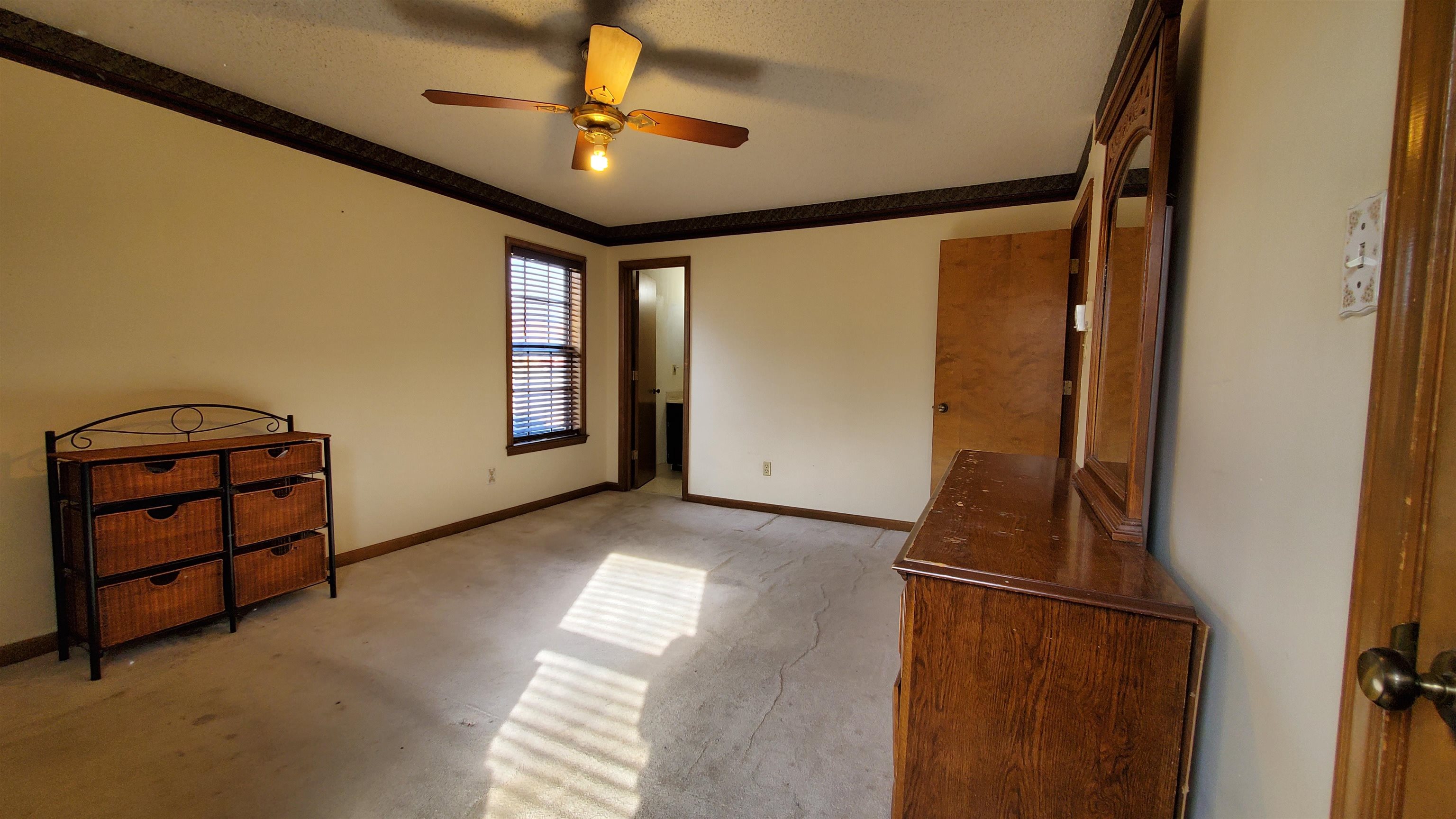 4192 Shadowfall Drive Memphis, TN 38141 - Photo 17 of 24 a view of an empty room with a window