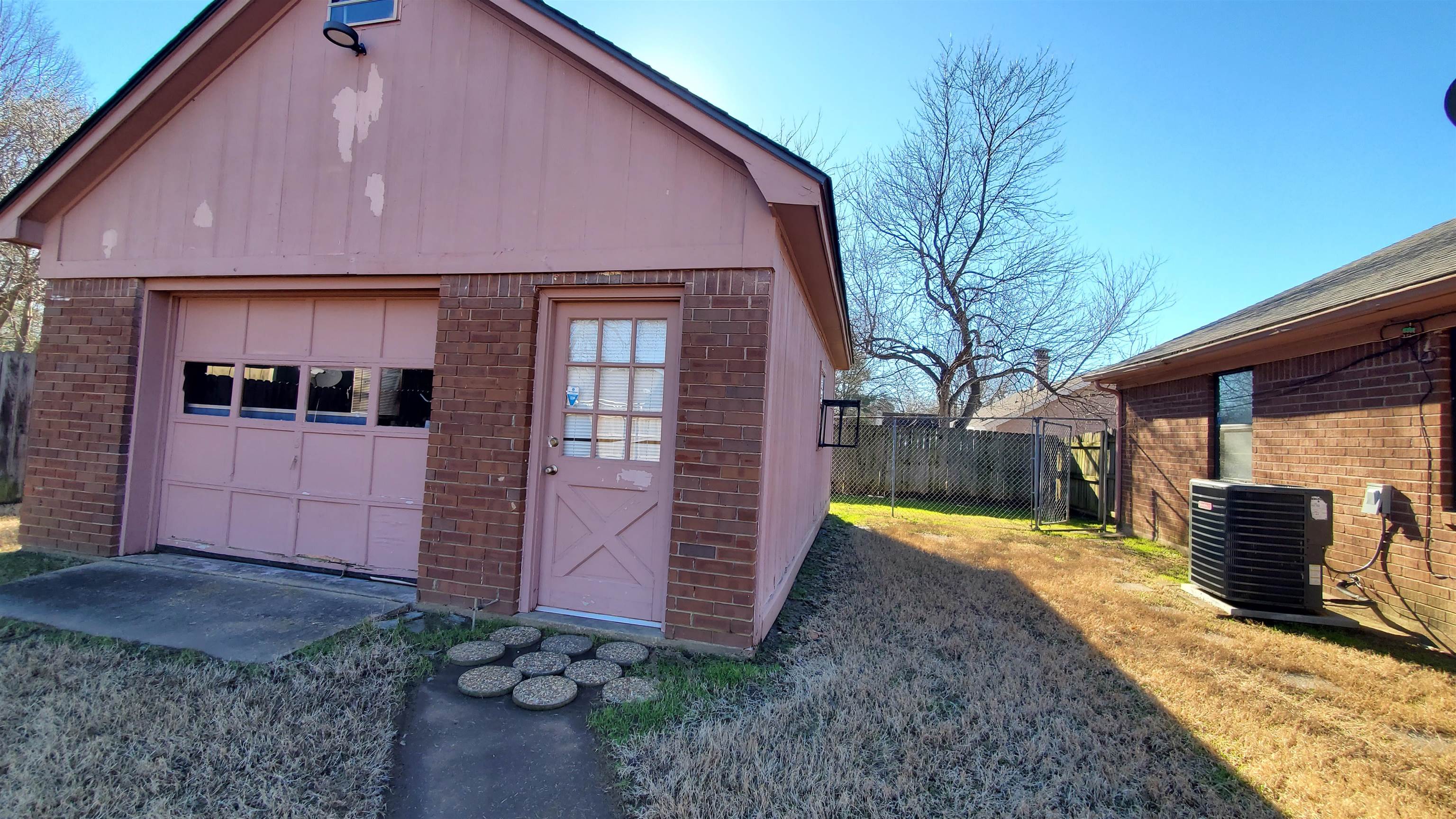 4192 Shadowfall Drive Memphis, TN 38141 - Photo 21 of 24 a view of a house with a yard