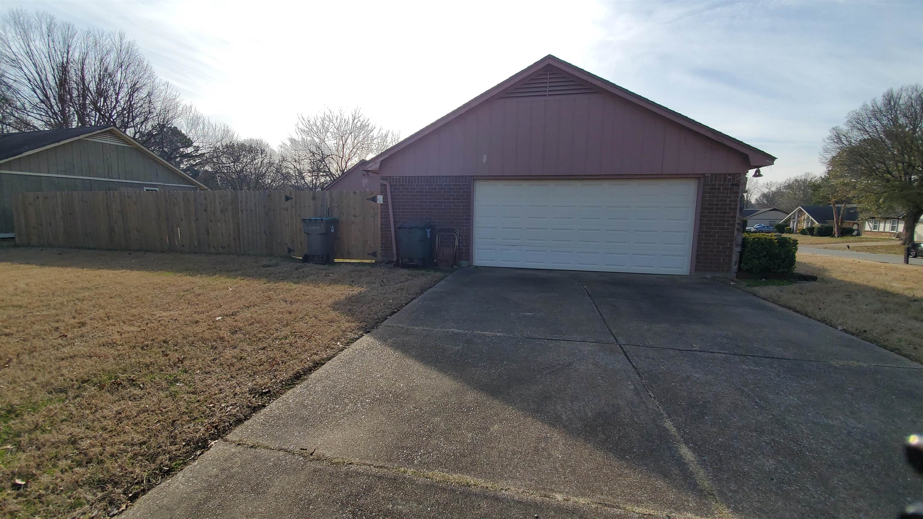 4192 Shadowfall Drive Memphis, TN 38141 - Photo 3 of 24 a front view of house with yard and trees