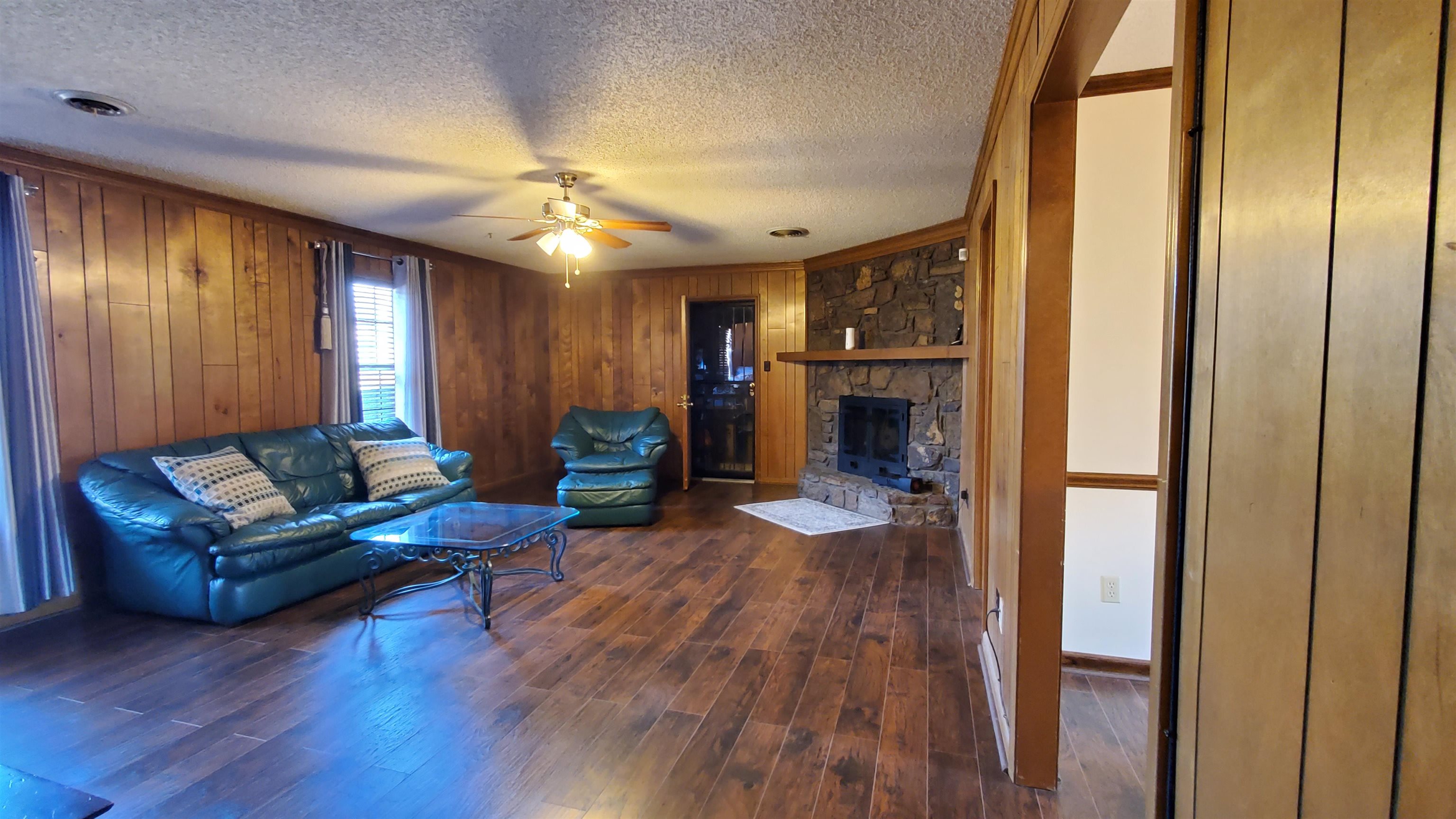 4192 Shadowfall Drive Memphis, TN 38141 - Photo 5 of 24 a living room with furniture and a fireplace