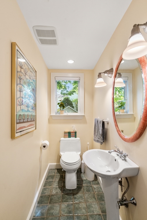 17 Charlotte Road Newton, MA 02459 - Photo 12 of 34 a bathroom with a sink toilet and a mirror