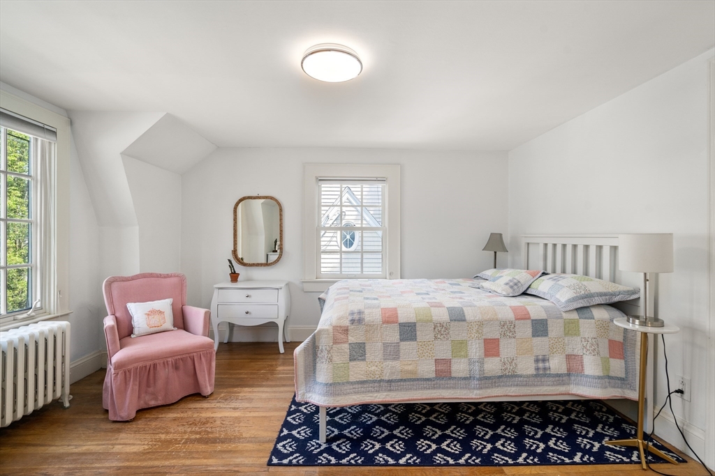 17 Charlotte Road Newton, MA 02459 - Photo 16 of 34 a bedroom with bed and wooden floor